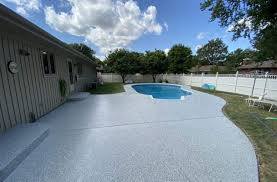 Epoxy and polyaspartic pool deck